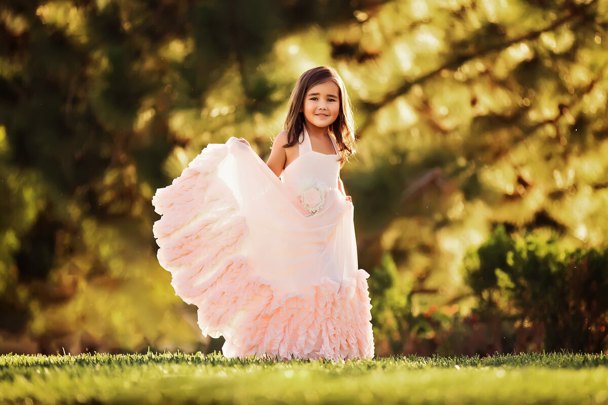 girl-dancing-pink dress-nps-monterey