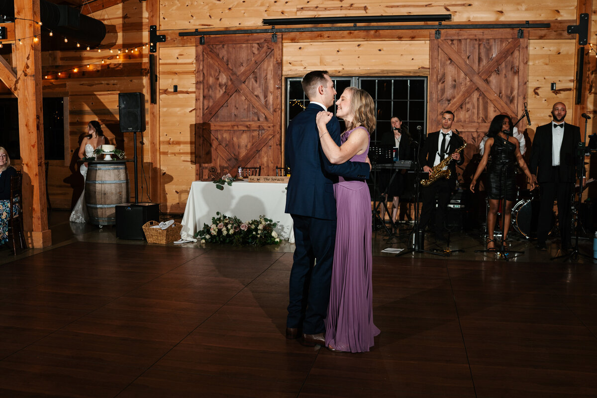 Reception decor featuring rustic charm and romantic candlelight