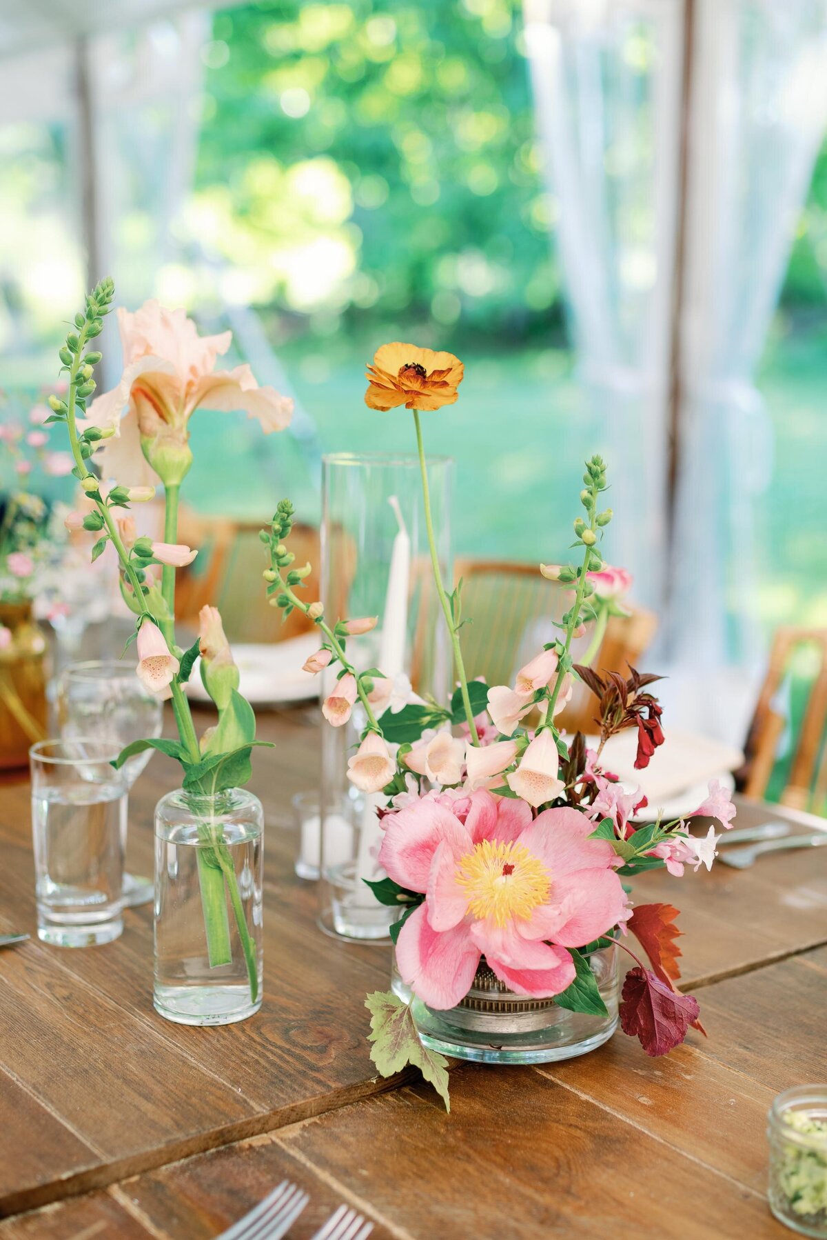 colorful summer wedding florals by nectar and root at wedding reception vt