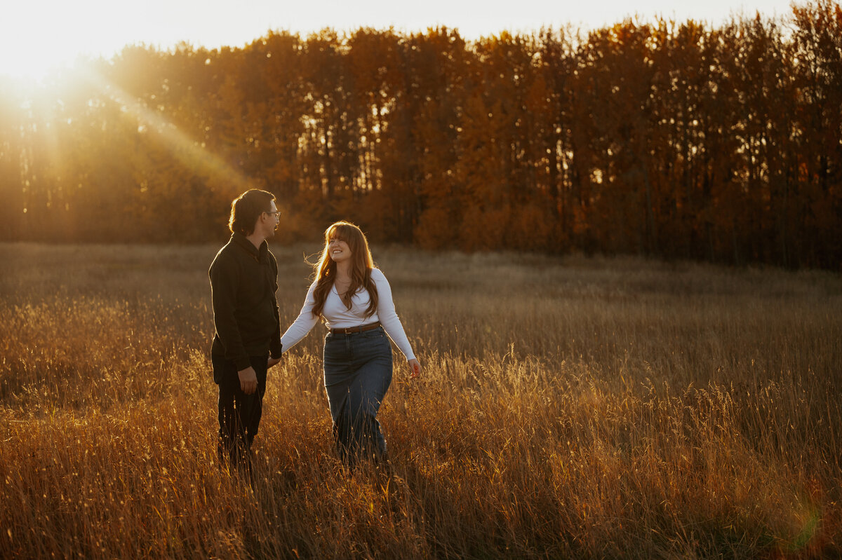 Photo of engaged couple during sunset in Alberta