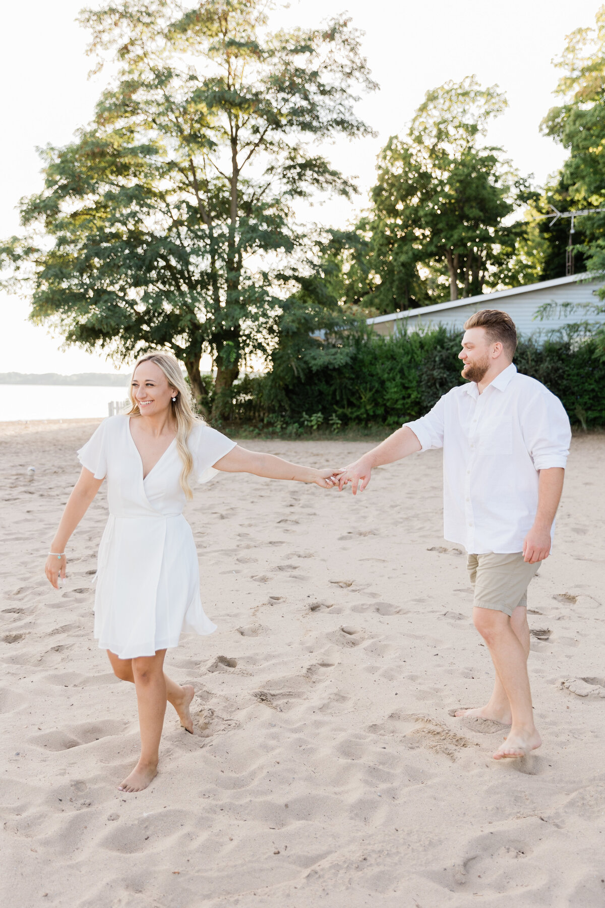 Couple holding hands on a beach