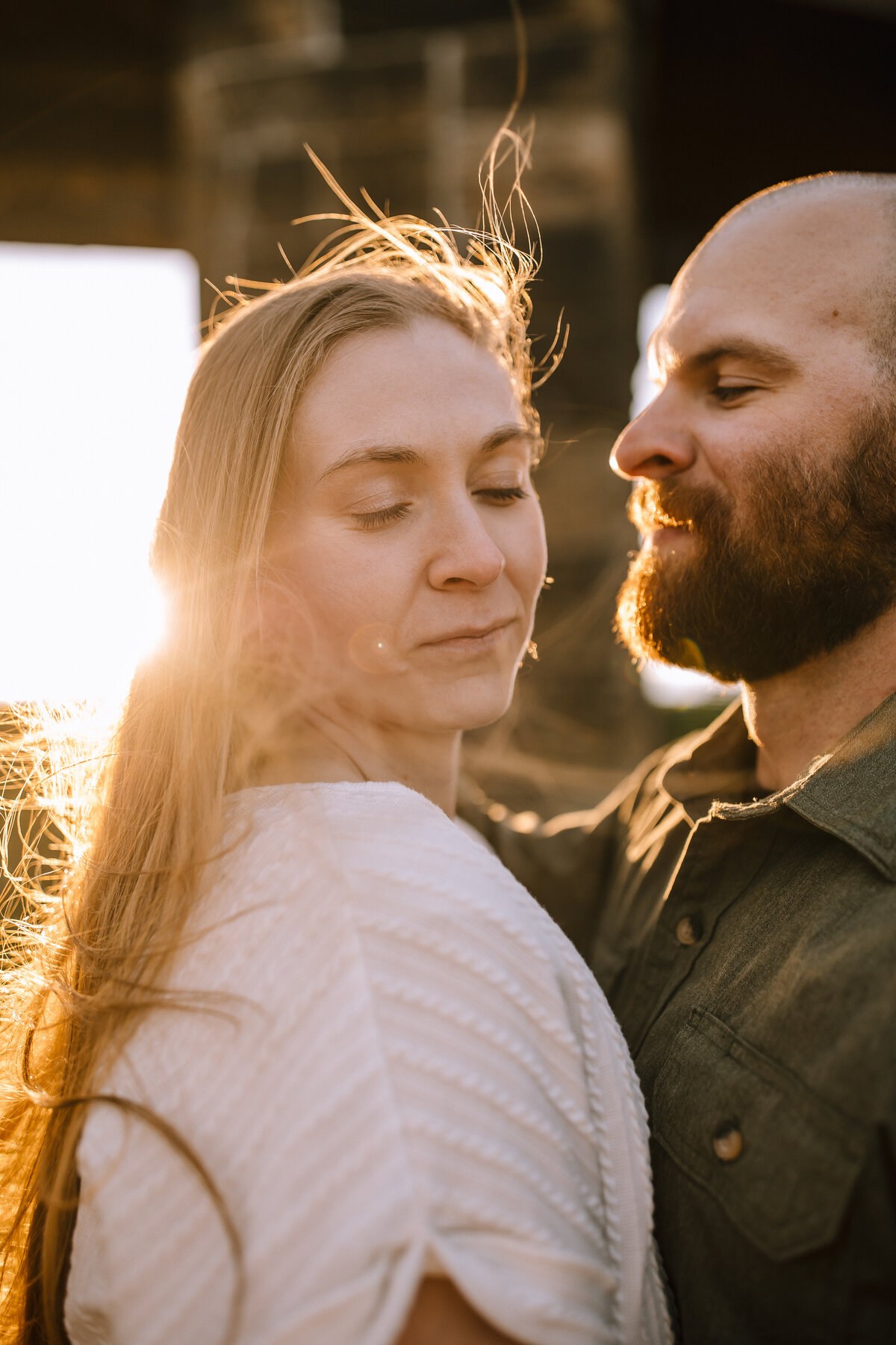 Engaged couple at the Aspinwall Riverfront.