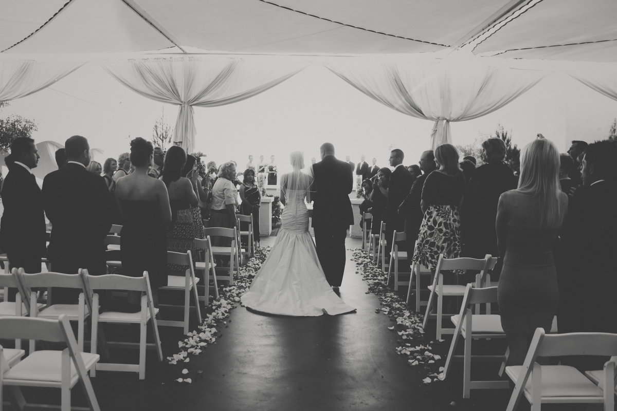 Wedding photo of bride and father walking down the aisle | Susie Moreno Photography