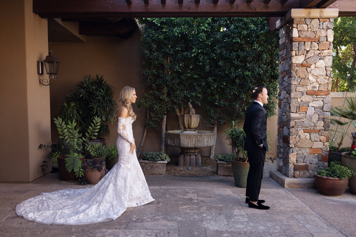 Bride and groom first look at Paradise Valley Country Club