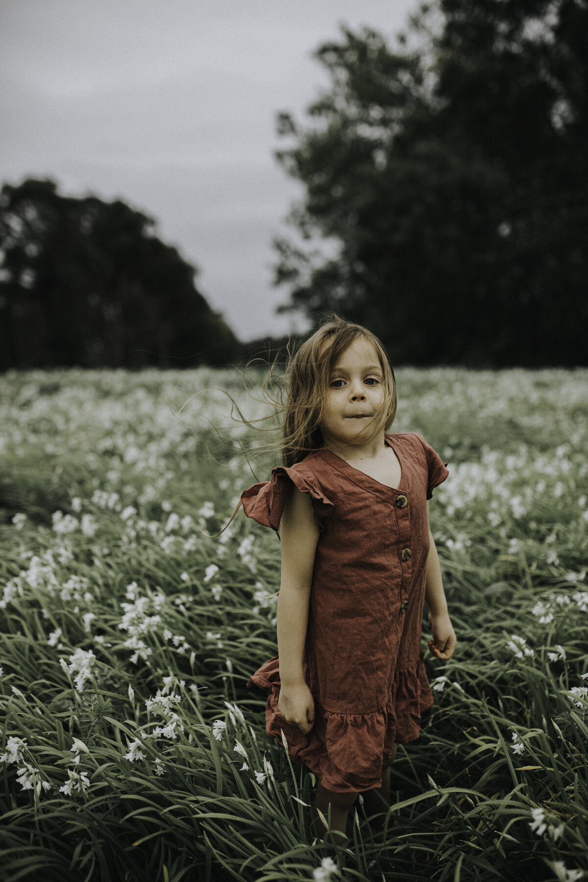 little girl portrait standing in flower field for Melbourne Family Photography Session with Sapphire and Stone Photography