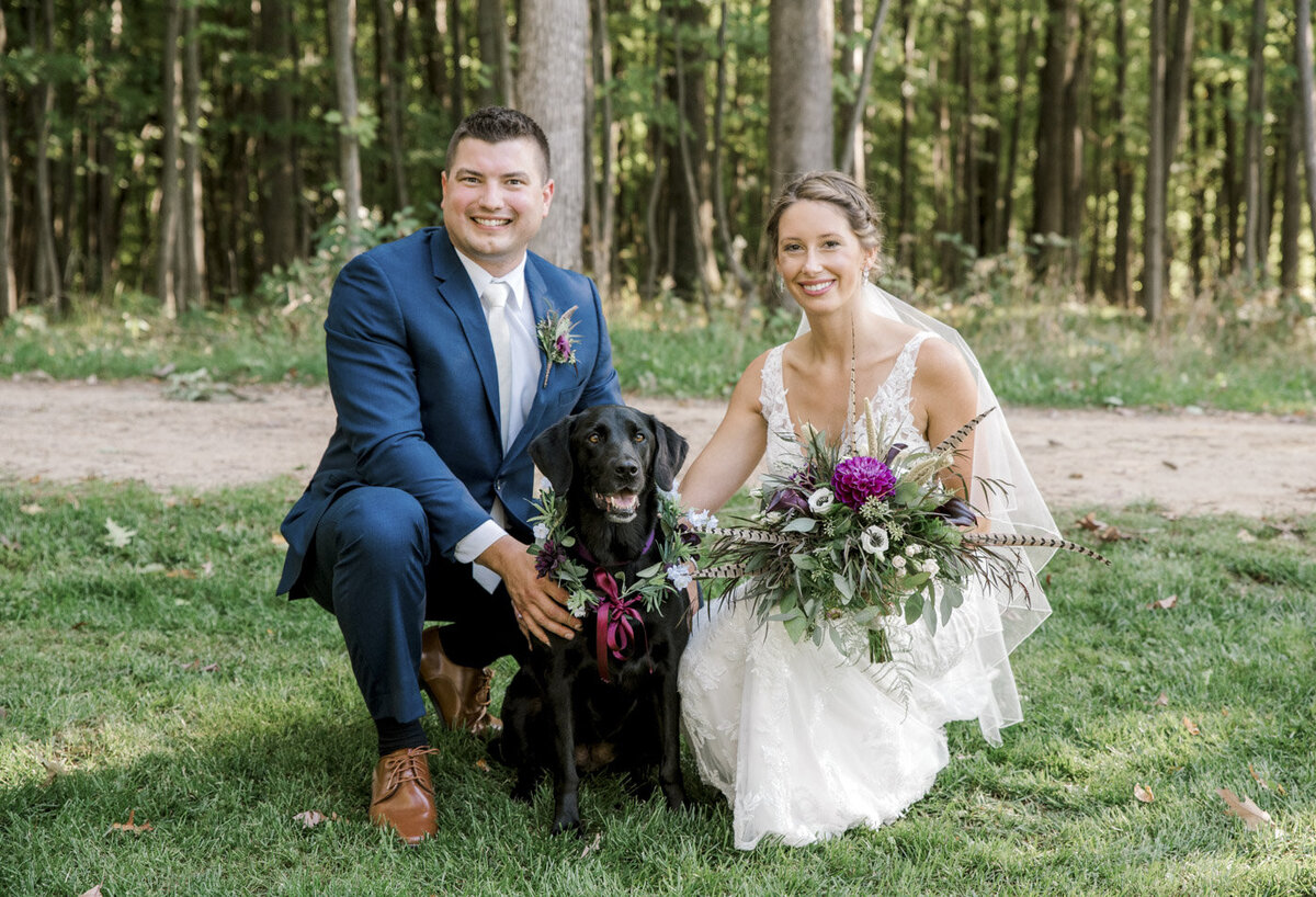 bride and groom with their dog