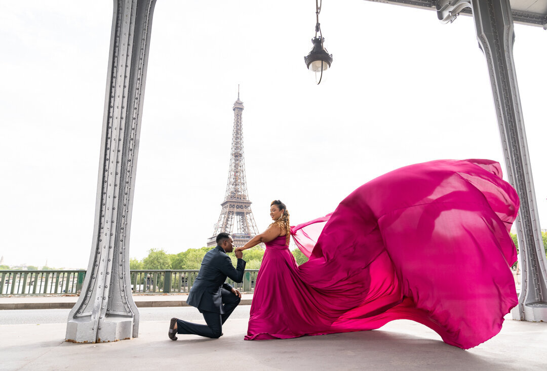 Bir Hakeim Bridge flying dress photoshoot, pink dress movement, Paris couple photography
