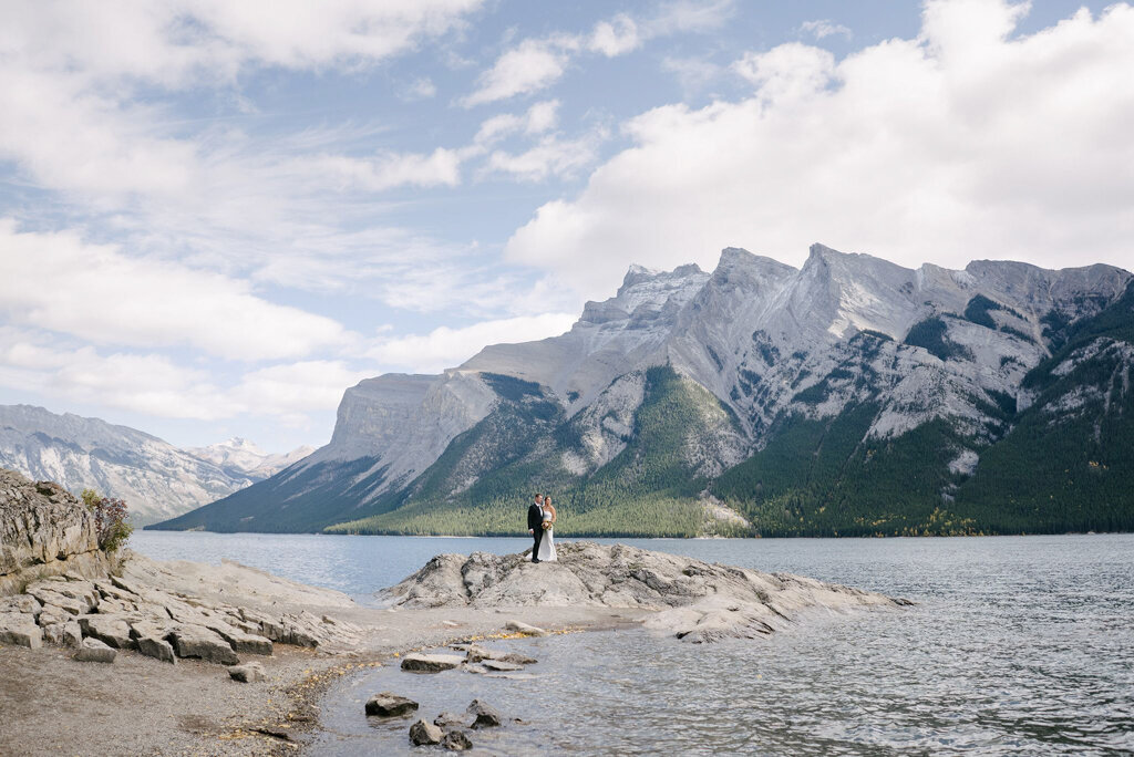 Bride and groom in mountains on Alberta captured by M2S Photography, timeless and elegant wedding photographer in Calgary, Alberta. Featured on the Bronte Bride Vendor Guide.