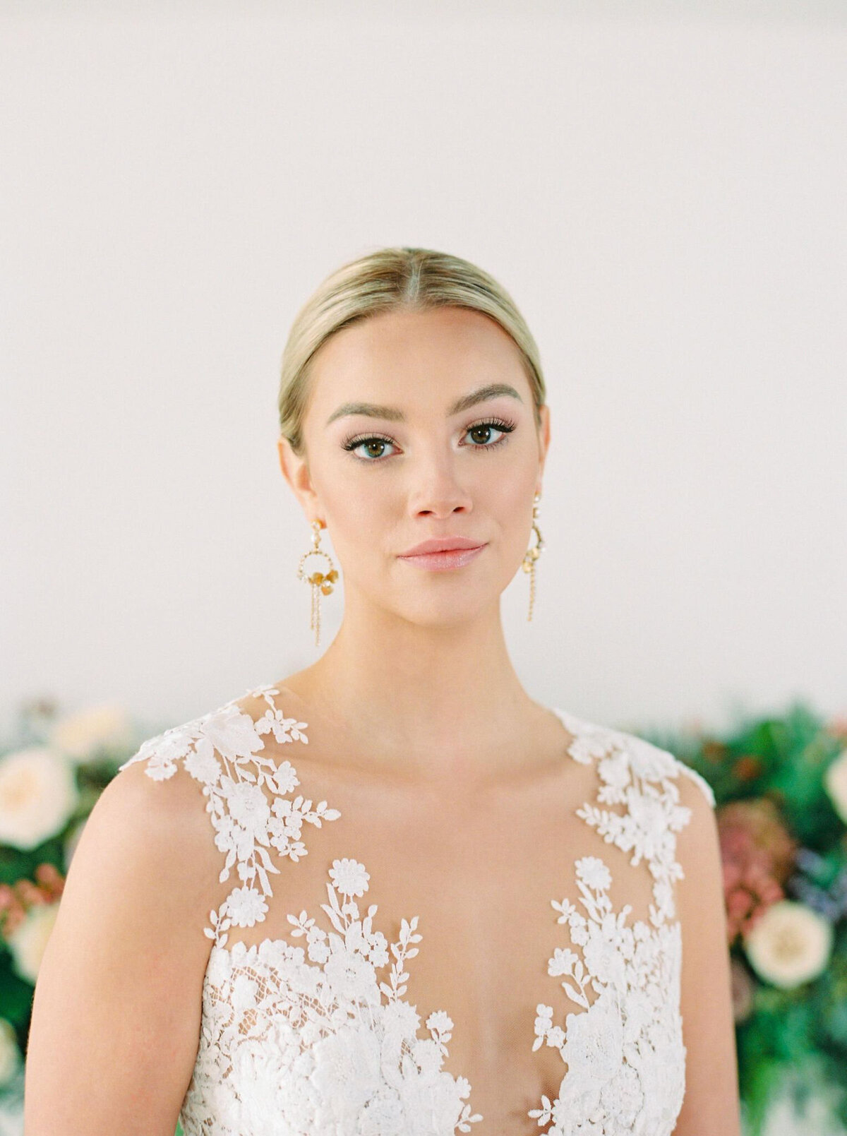 Simple and elegant bridal hair and makeup by Madi Leigh Artistry, experienced and inclusive Calgary hair & makeup artist, featured on the Brontë Bride Vendor Guide.