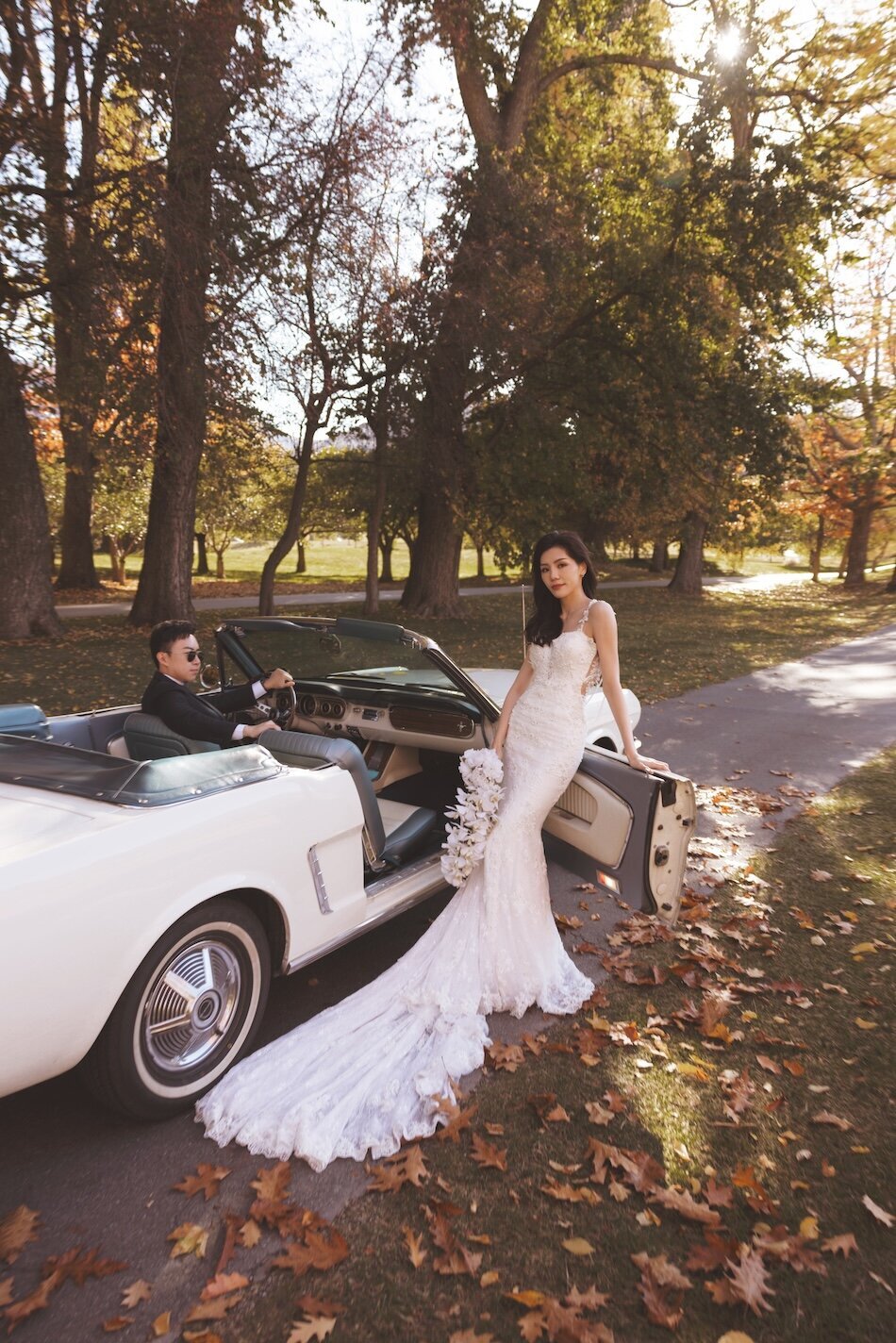 Autumn wedding shoot at Millbrook, Arrowtown. Vintage car & helicopter.