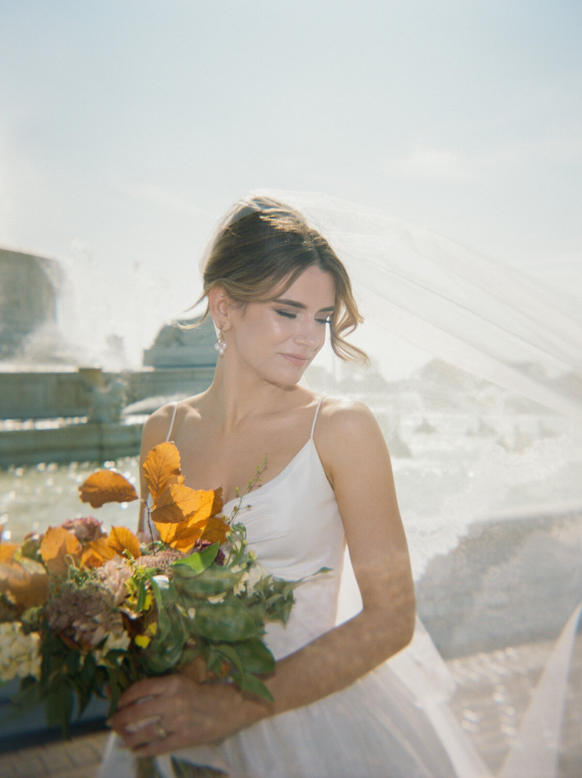 soft film bridal portrait at the Belle Isle Fountain, Detroit