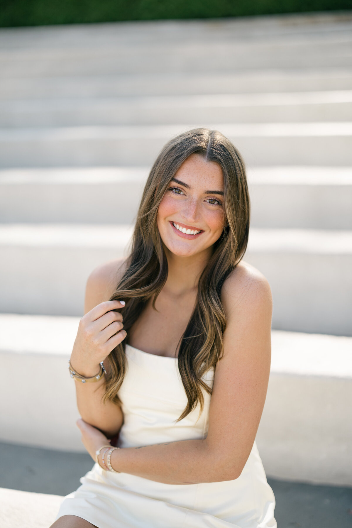 Senior Graduation Portraits on Campus Steps – Fayetteville Arkansas Senior Photographer