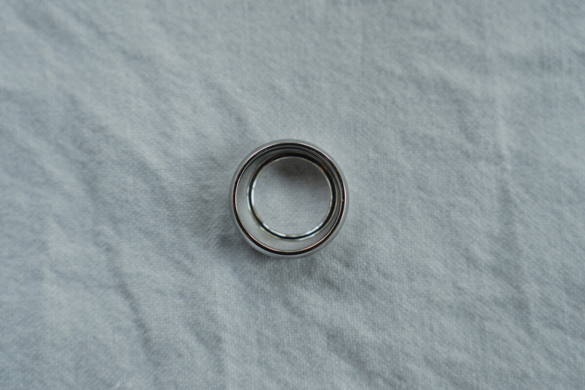 Ring photo during wedding details photos at Heritage Acres in Saanichton by Latitude 49 Photography