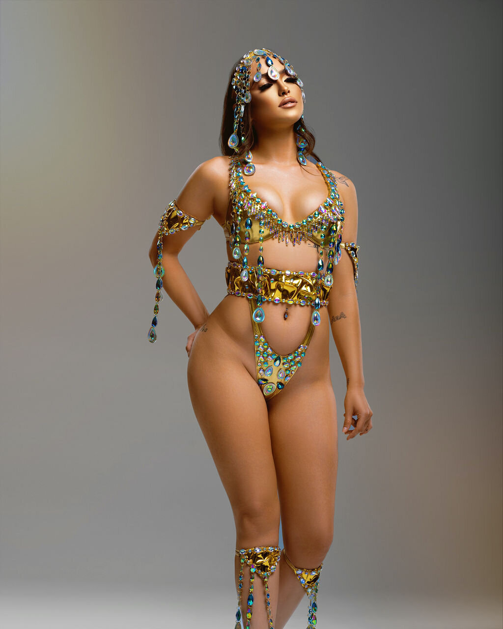 Gold costume for Caribana Toronto. Register to play mas with Sunlime Mas