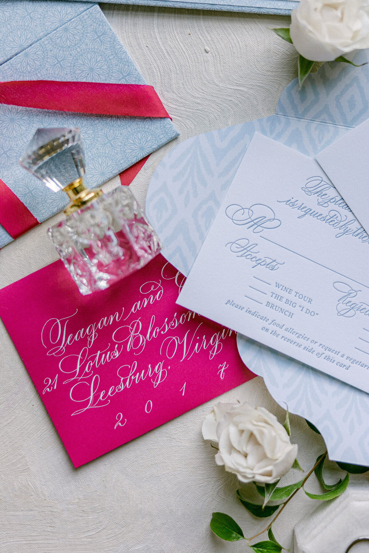 invitation design with florals  and perfume in washington dc