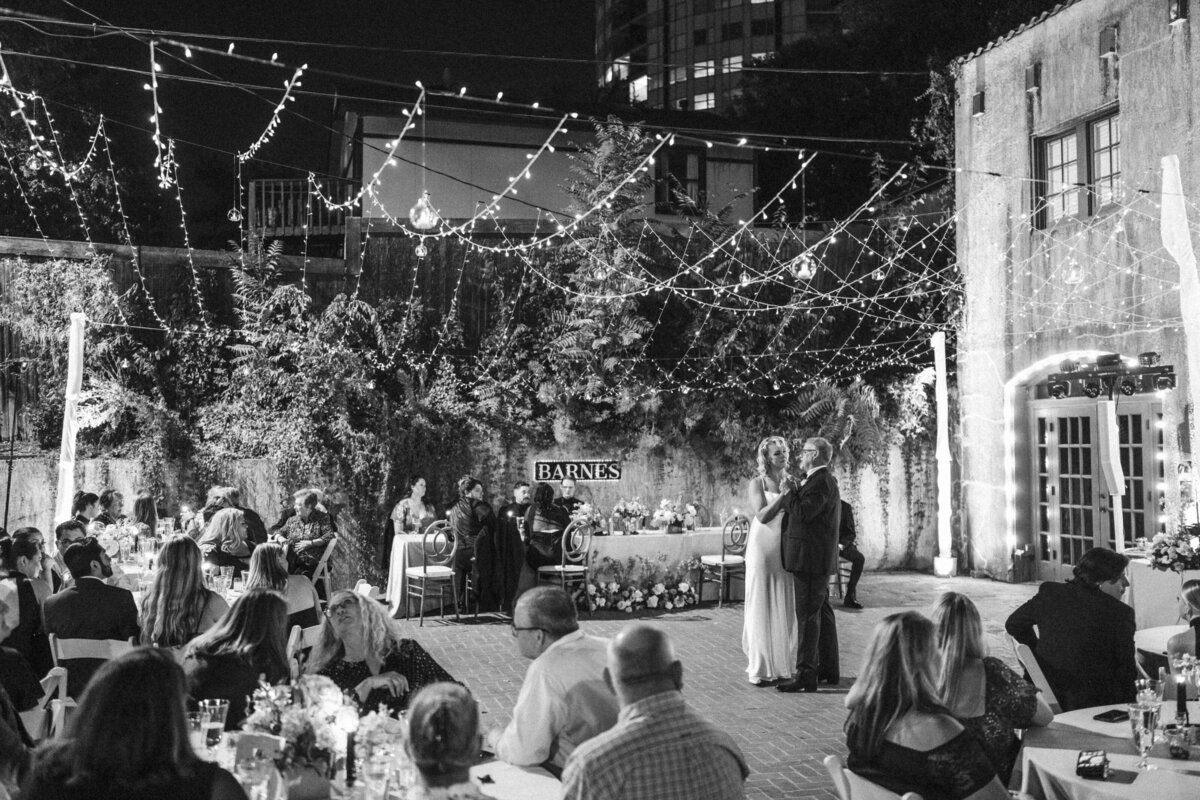 father-daughter-dance-under-twinkle-lights-outdoors