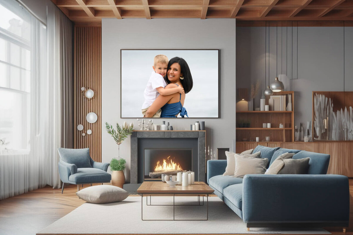 Living room with a framed photo of a mom and son hugging at the beach for their Burlington Family photography session
