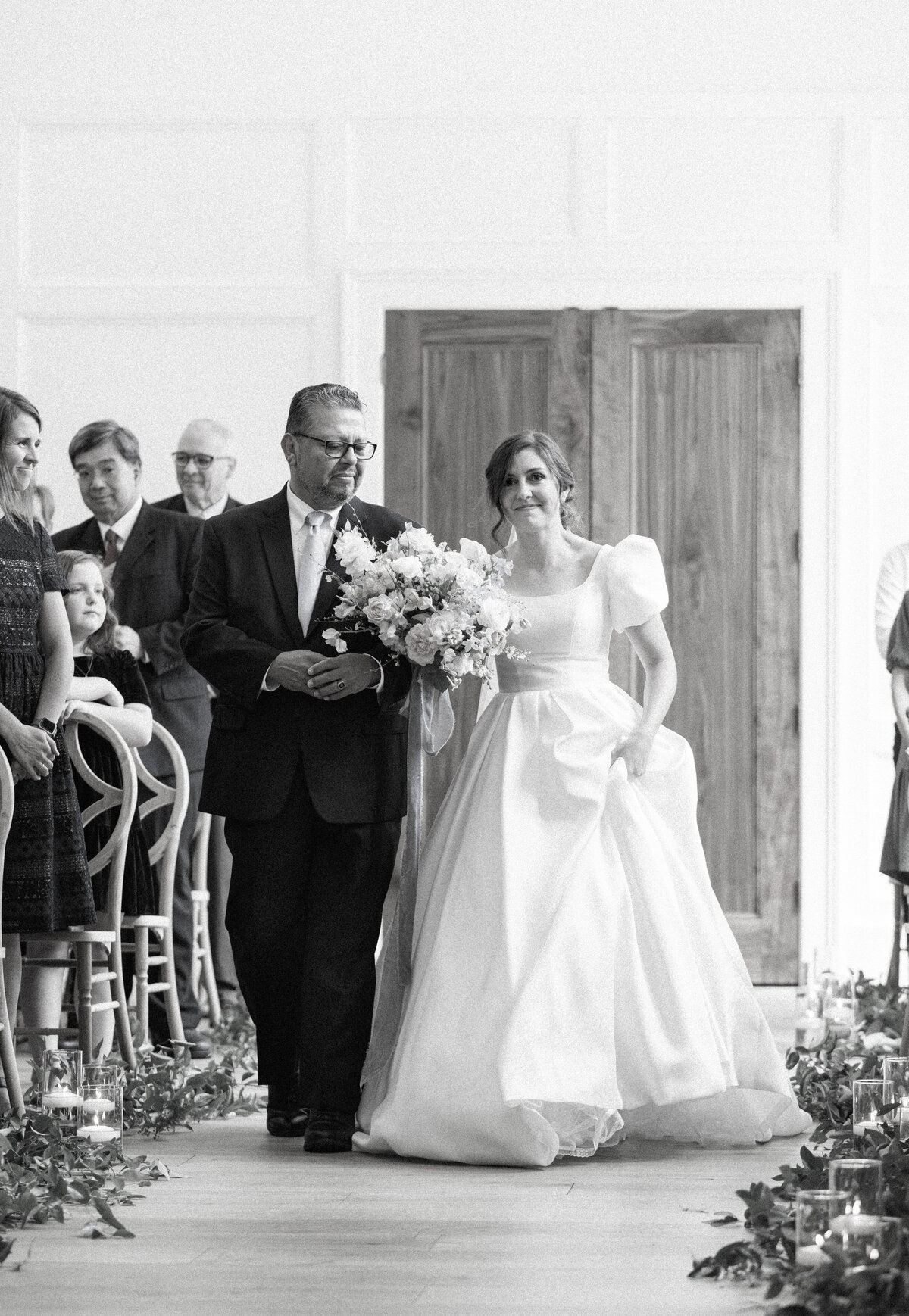 Bride walking down the aisle at Twenty and Creek.