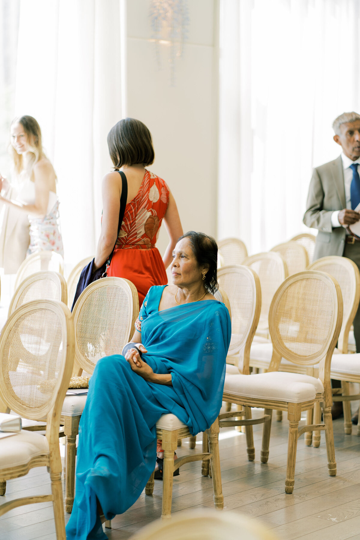wedding guests being seated at the pearle hotel.