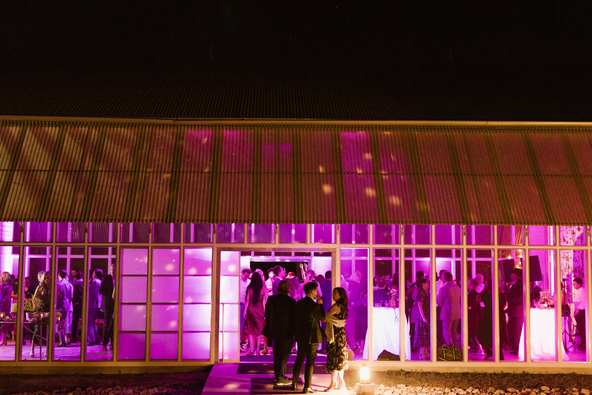 Prospect House Wedding illuminated in pink liights,  Austin