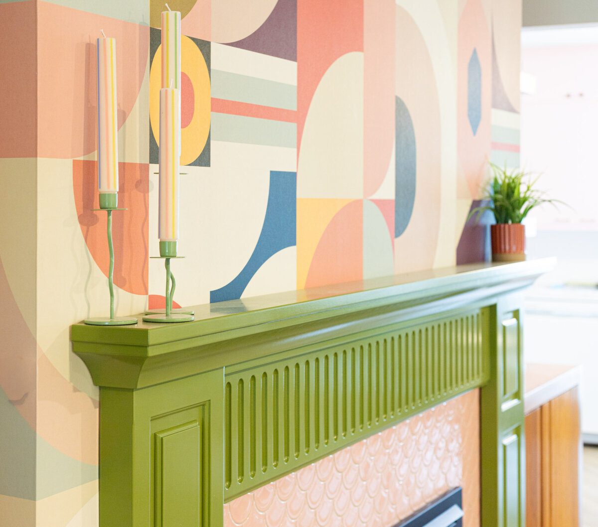 chartreuse fireplace design with colorful wallpaper