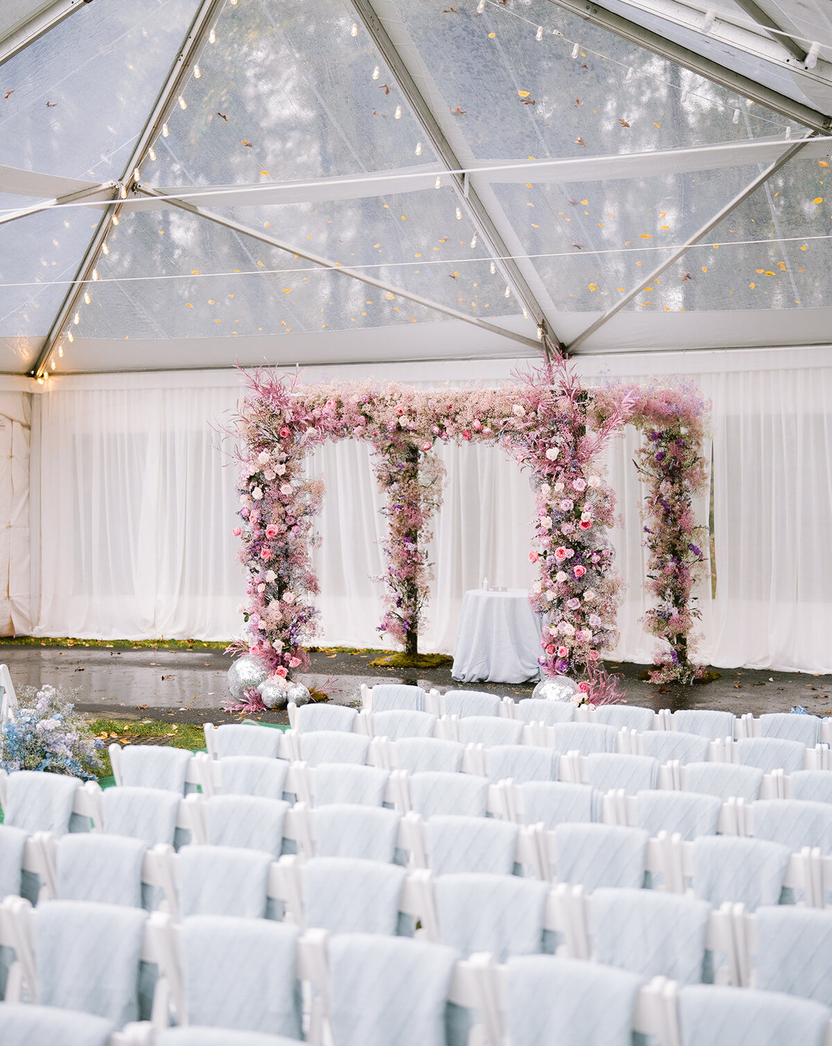 light-pink-colorful-wedding-flowers-ceremony-arch-fixture-floral-installation-enza-events-katonah-tented-wedding