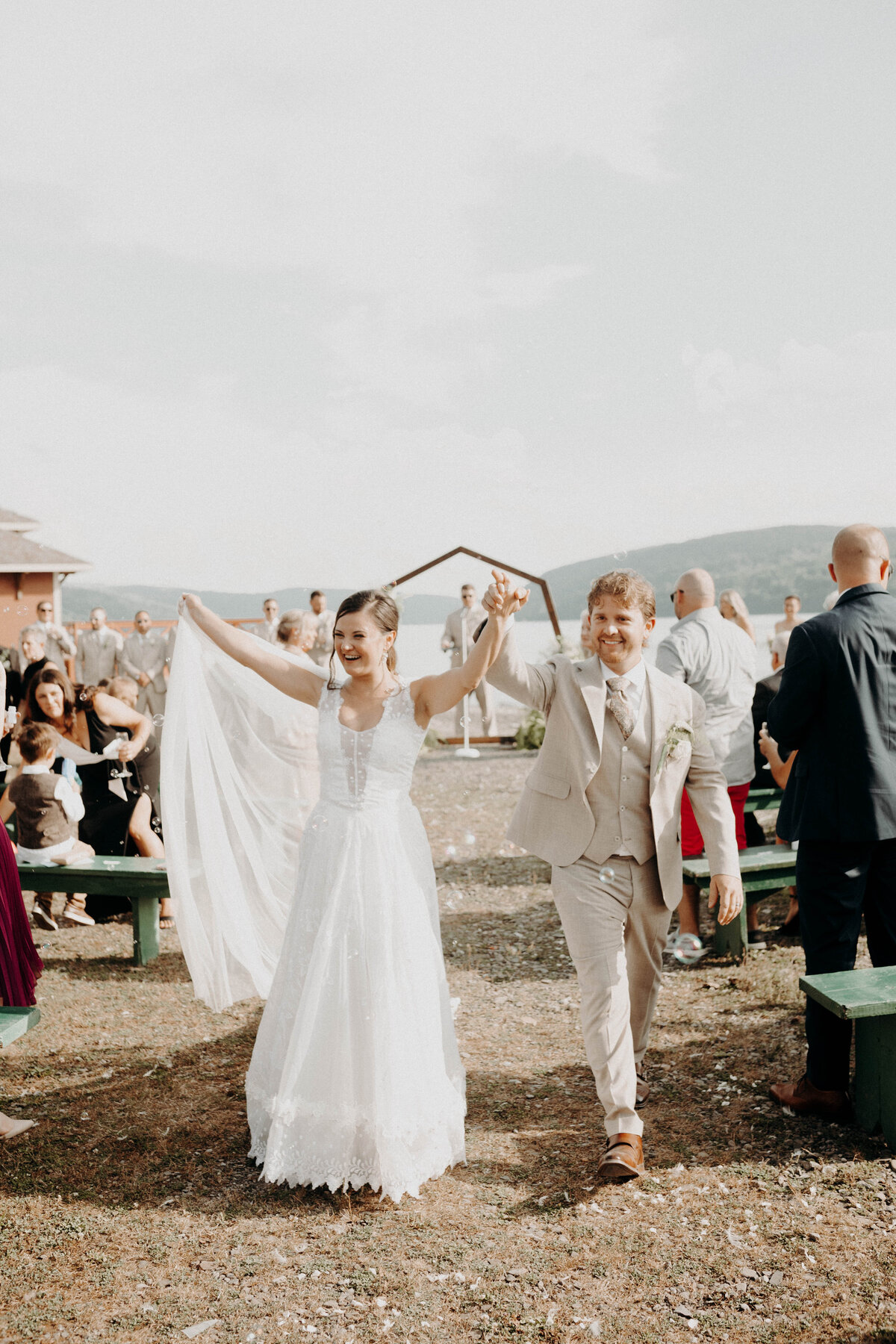 celebratory bride and groom ceremony photography finger lakes skaneateles new york