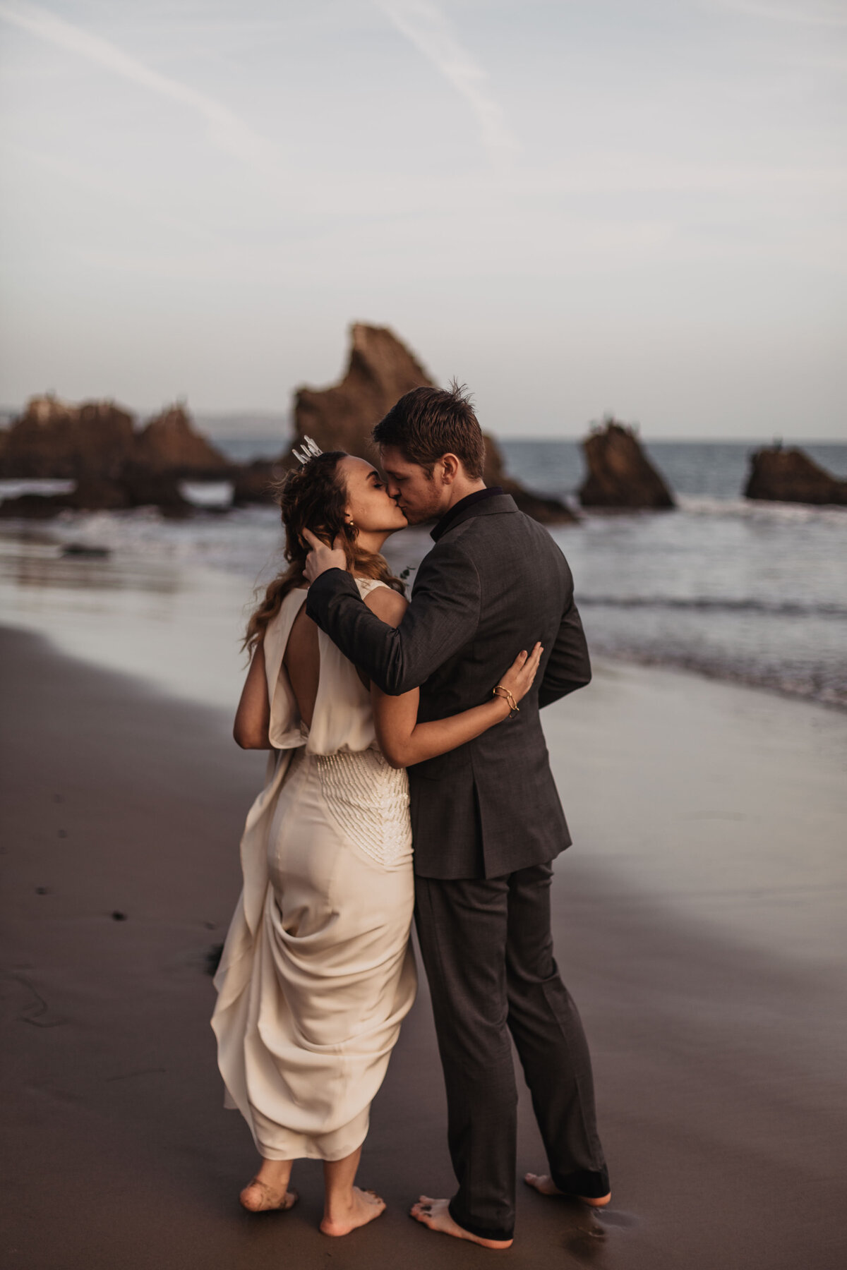 Adventure elopement at El Matador State Beach in Malibu, California photographed by Magnolia and Ember.