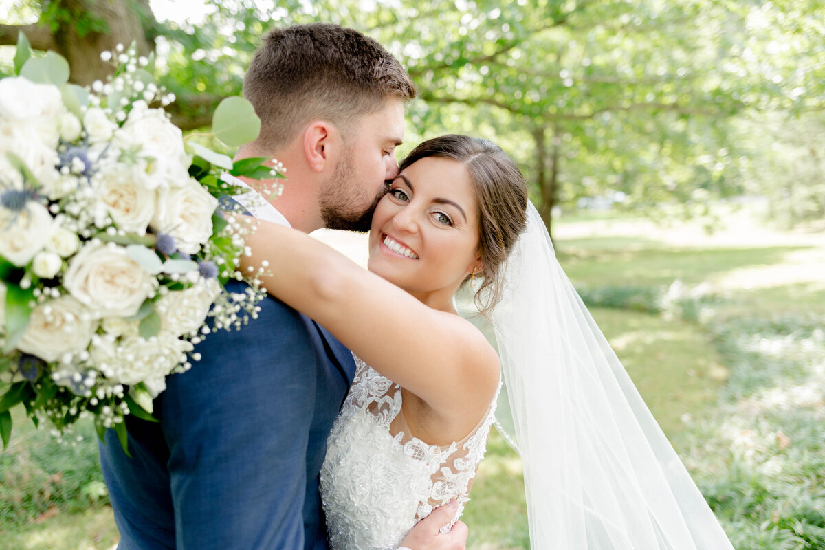 Timeless 'Mr. and Mrs. Love Forever' wedding photo captured by Style & Grace Photography in Springfield, IL, highlighting the newlyweds' enduring love and commitment on their special day.