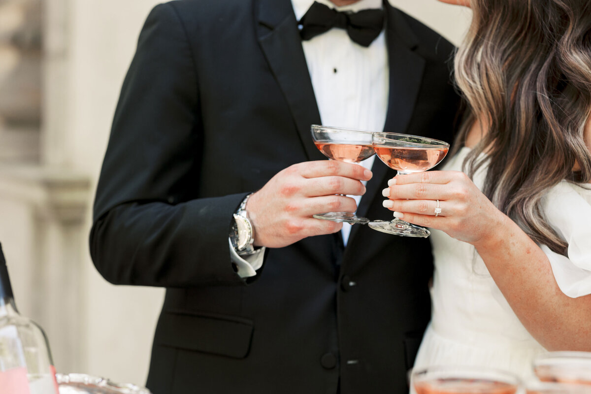bride and groom toasting champagne  at Atlanta venue