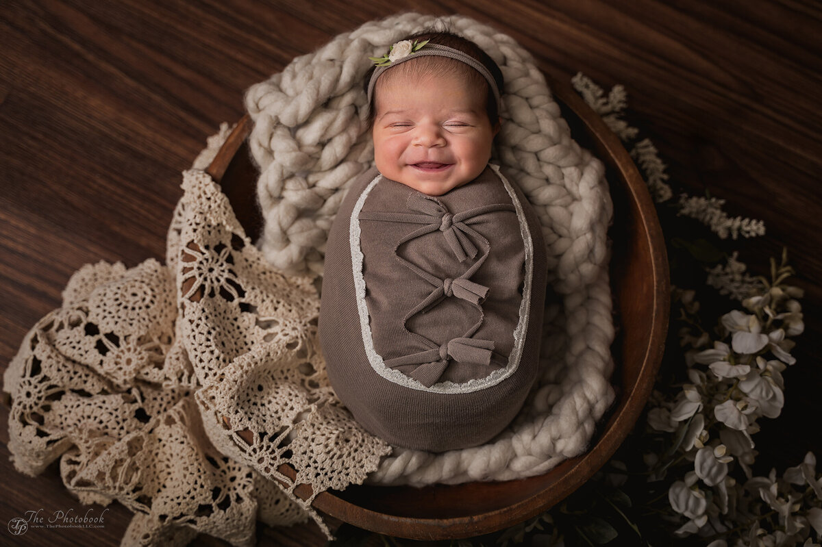 TP6_2313-Newborn-pink-girl-photographer-Michigan-flowers-smile
