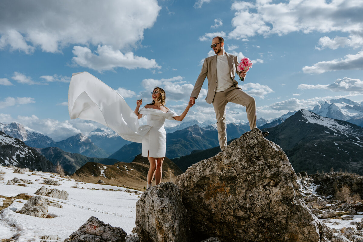 photo of couple in snowy mountains