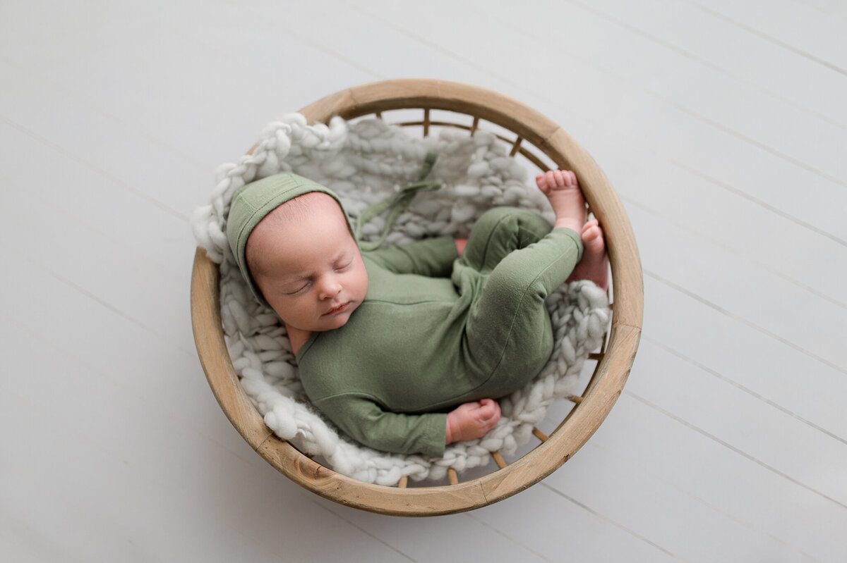 Newborn in olive green studio session