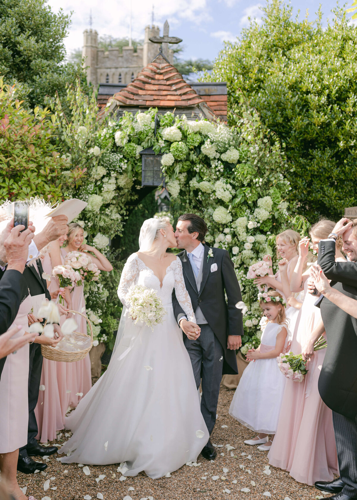 chloe-winstanley-weddings-hambleden-church-confetti-kiss