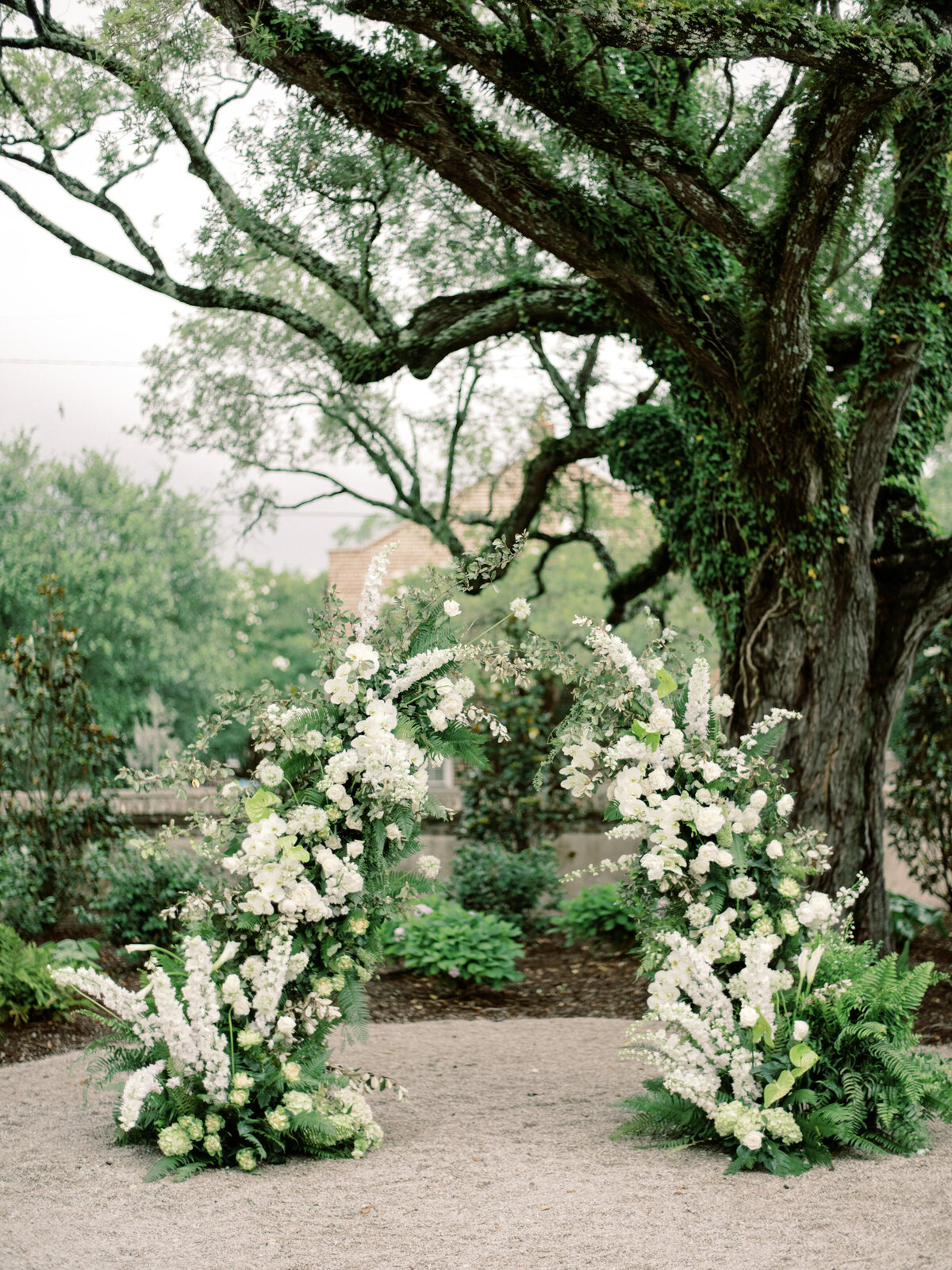 Beautiful floral arches adorned with fresh flowers, ideal for outdoor Charleston weddings, creating a stunning backdrop that embodies love and celebration.