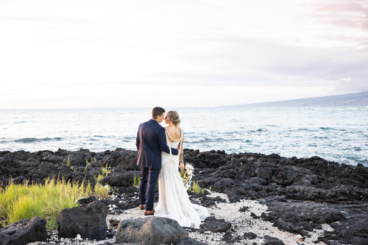 Big Island Wedding Photographer - Bride  and groom on lava rocks