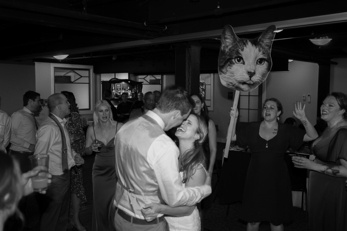 Photo of a bride and groom dancing at a reception party in New York