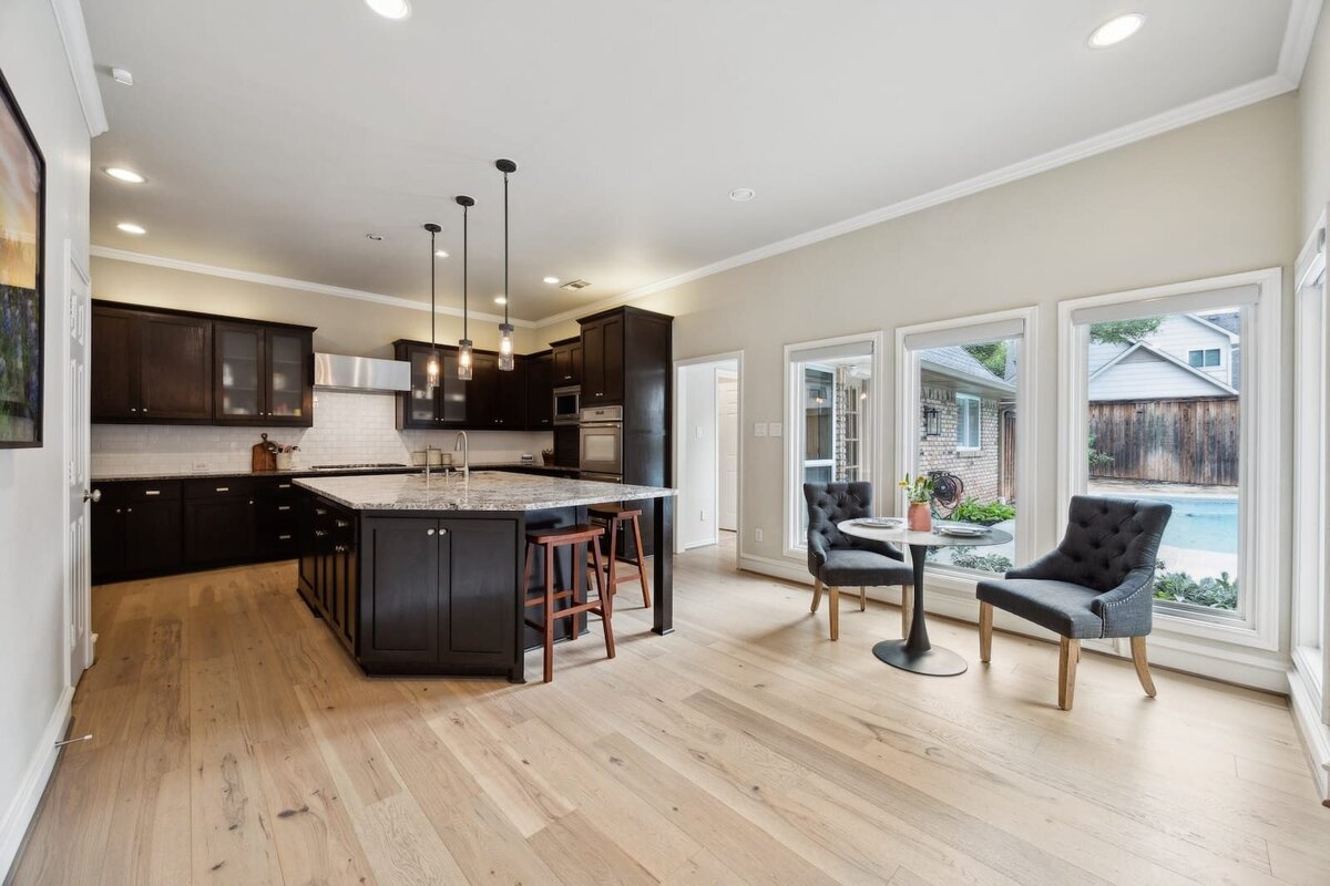 17828_cedar_creek_canyon_dr_dallas_tx_kitchen_-_chef_inspired_space_with_large_island_and_pool_view_-_haven_realty_group