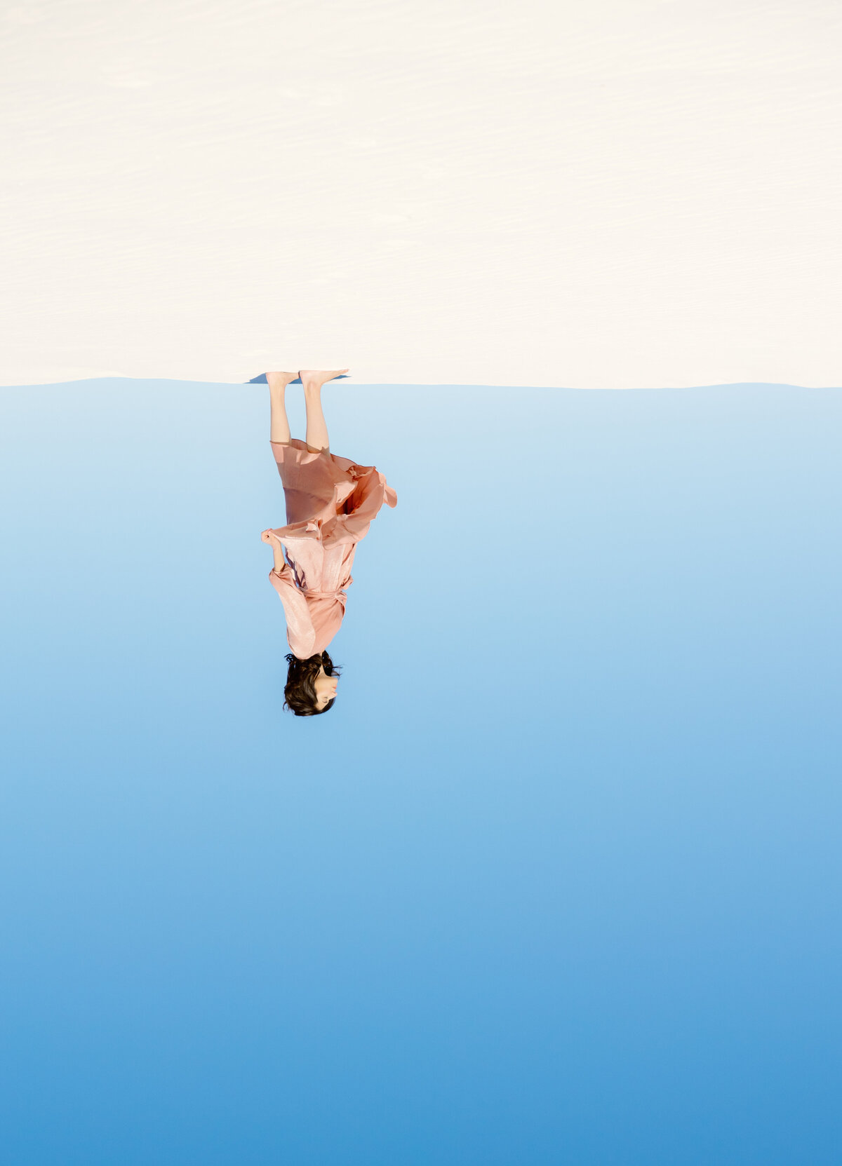 Model stands in an upside down world