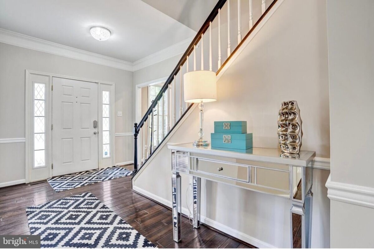 modern-entryway-with-staircase-mirrored-console-table