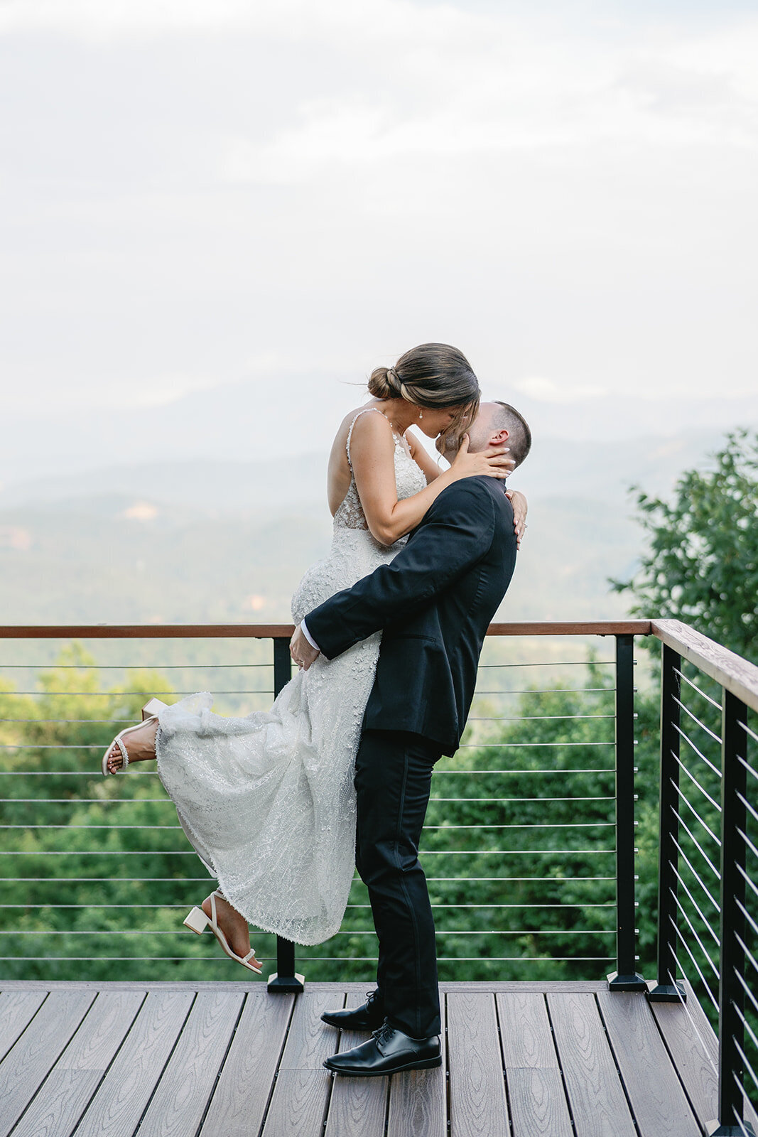 Bride and groom pictures overlooking the mountains at The Trillium