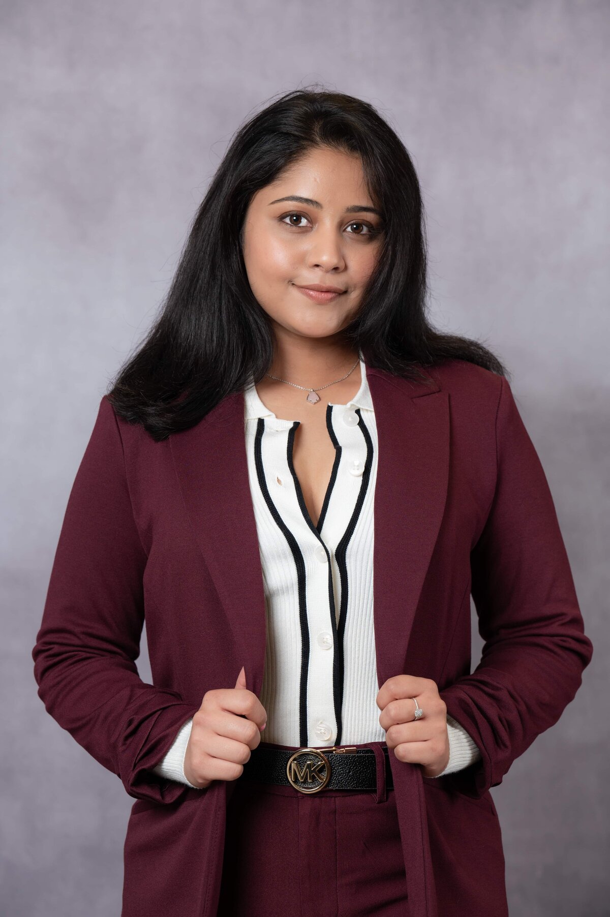 Clean and polished studio headshot with backdrop in Williamsburg VA