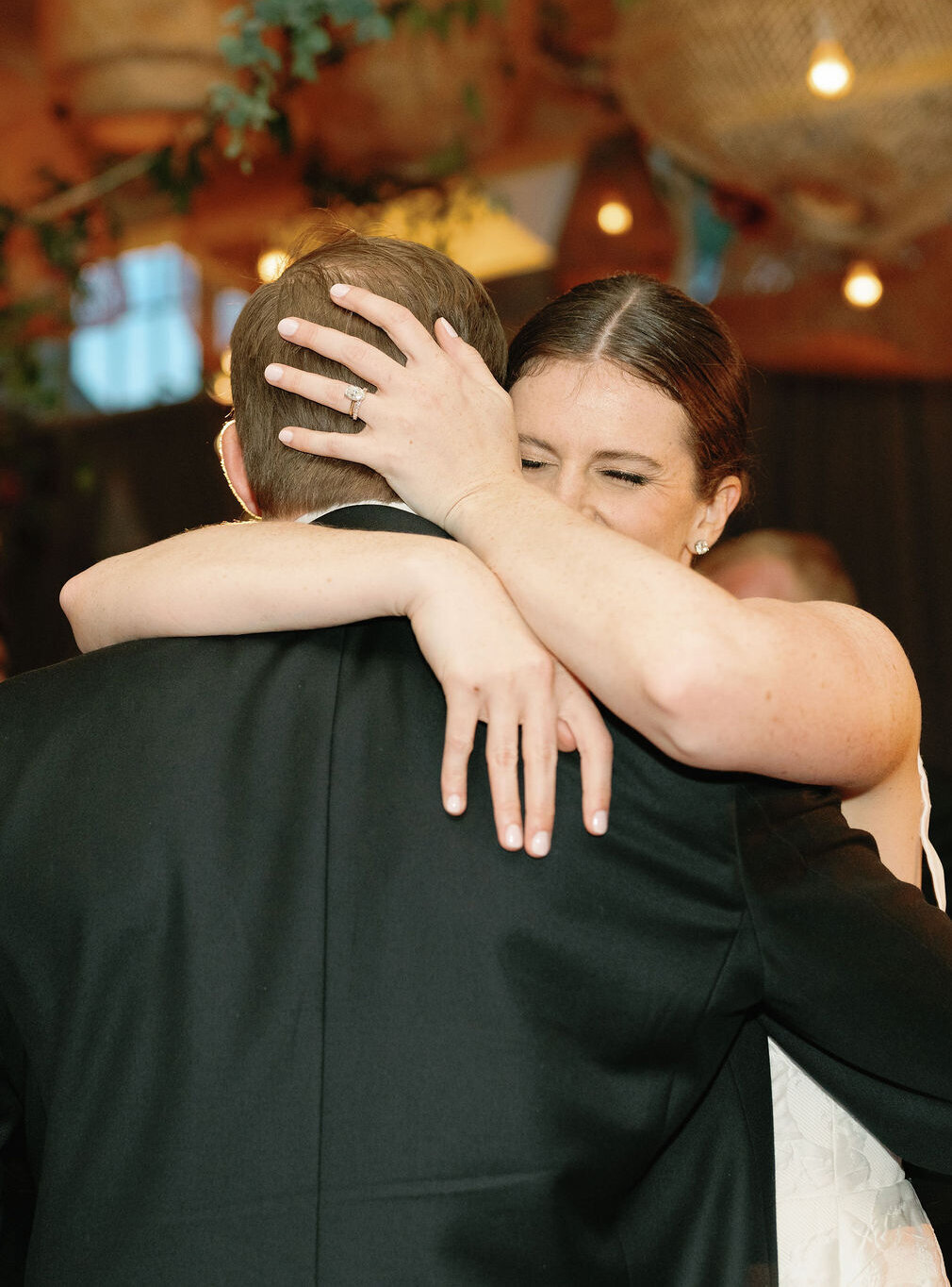 Bride and groom dancing.