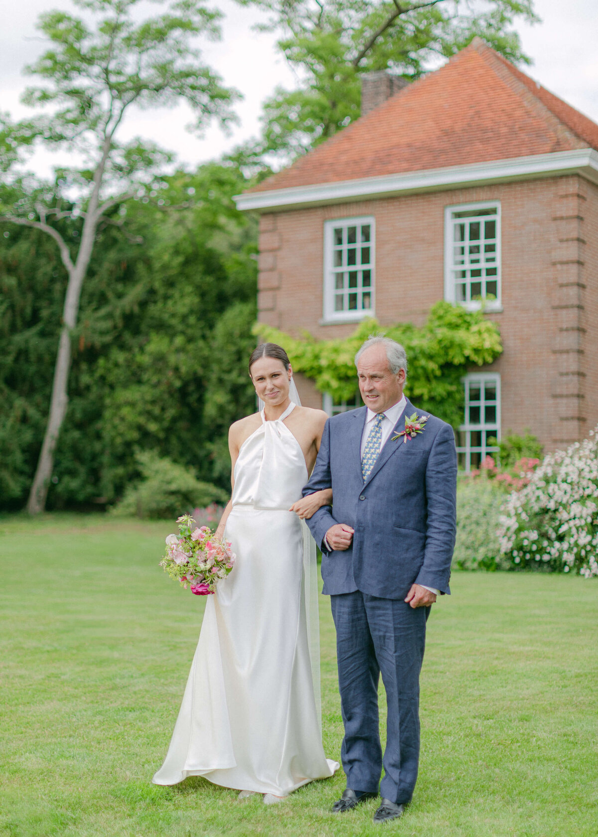 chloe-winstanley-weddings-outdoor-ceremony-home-father-bride-aisle