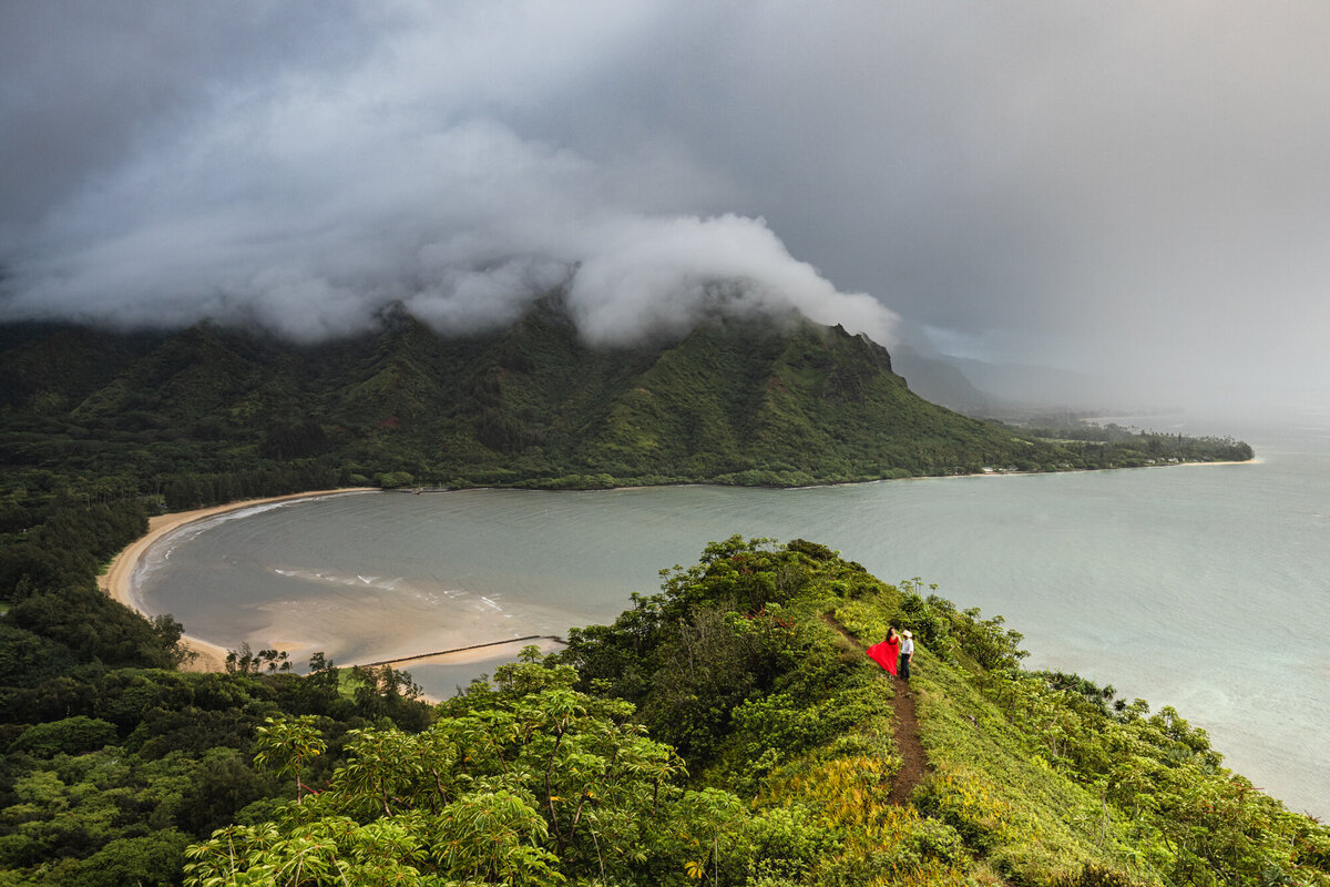 sunrise engagement photo in Oahu taken by Minnesota wedding photographer Marcus Hanenburg