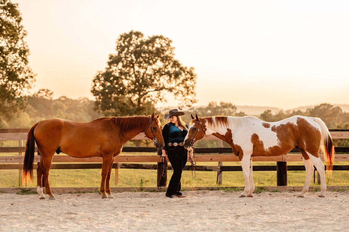 Western rider takes photos with her two geldings during a gorgeous sunset near Birmingham, Alabama.