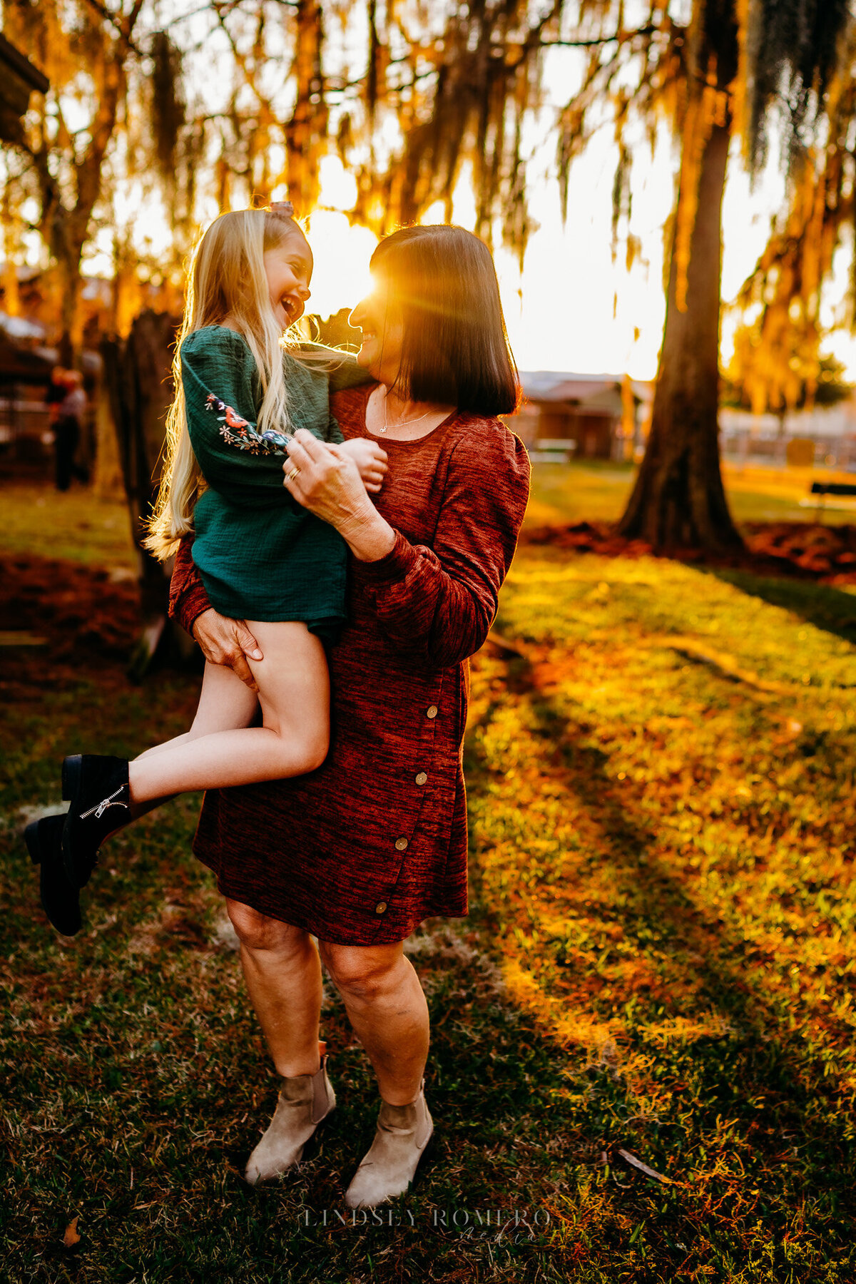 golden hour photo of grandmother and granddaughter with sun flare in Patterson, la