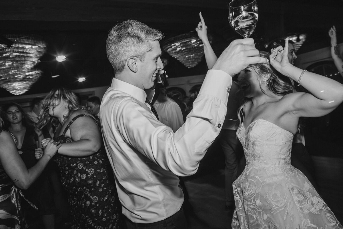 Wedding guests dancing at a reception 