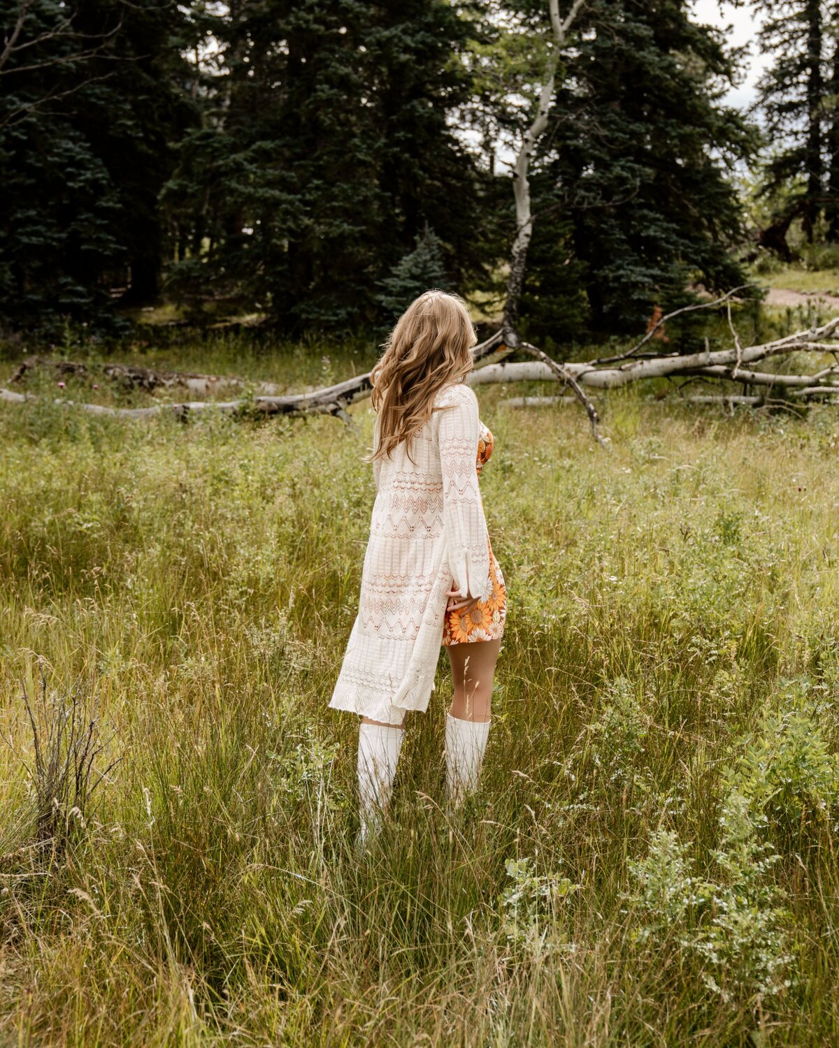 denver senior photography - girl walking through field