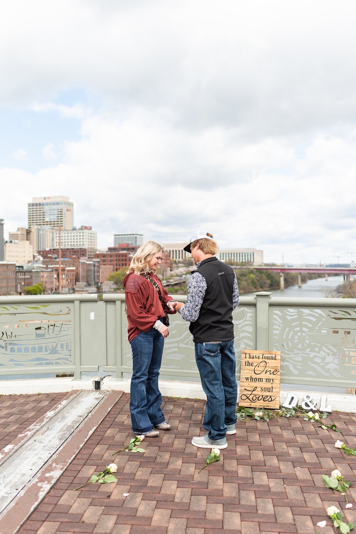 Surprise-proposal-photos-in-Downtown-Nashville-Pedestrian-Bridge+15